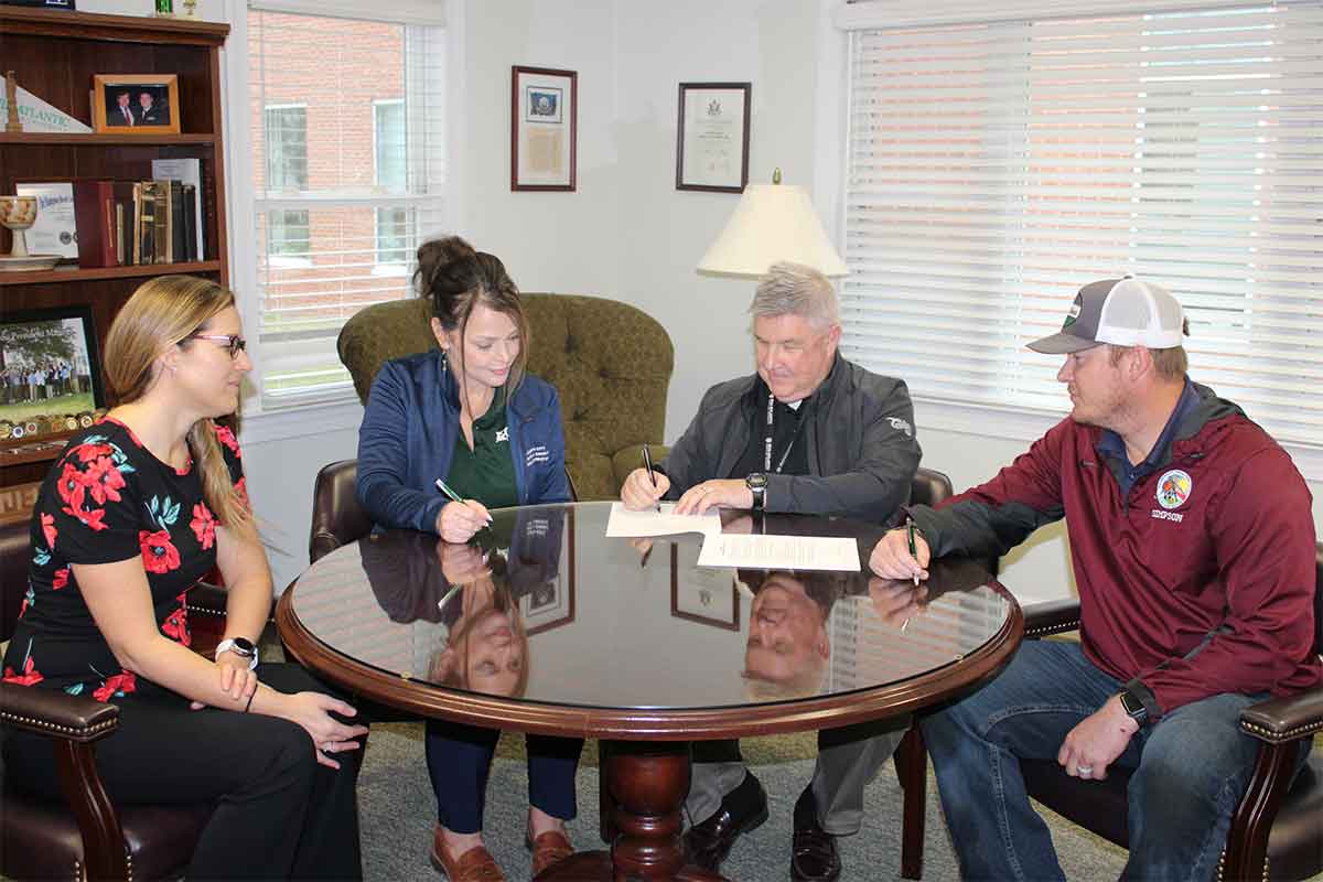 Photo from left to right: Sara Shepherd, MACU Vice President for Finance; Stacy Williams, Interim Director of Parks & Recreation; John Maurice, MACU President; Nathaniel Simpson, Parks & Athletic Grounds Superintendent.